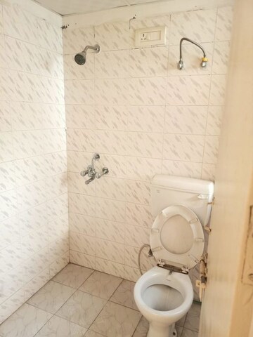 Bathroom in 3 BHK Apartment at Adore Happy Homes Pride, Sector 75 – for Rent