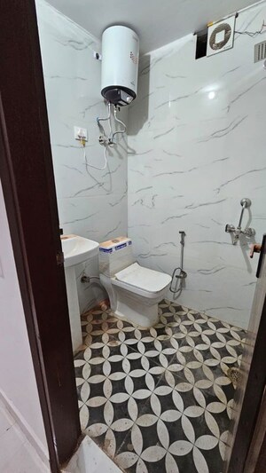 Bathroom in 2 BHK Apartment at Palm Residency Chhatarpur, Chattarpur – for Rent