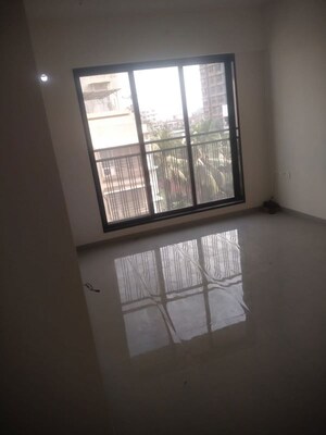 Room in 2 BHK Apartment at Aakar Padma Rekha CHS, Goregaon East – for Rent