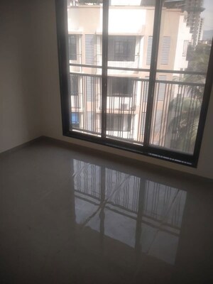Room in 2 BHK Apartment at Aakar Padma Rekha CHS, Goregaon East – for Rent