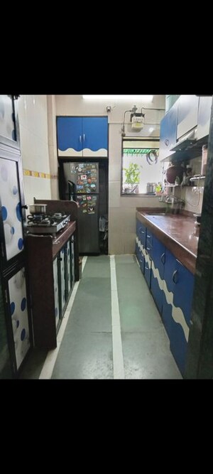 Kitchen in 2 BHK Apartment at Rutu Enclave, Kasarvadavali – for Rent