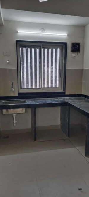 Kitchen in 2 BHK Apartment at Tower View CHS, Worli – for Rent