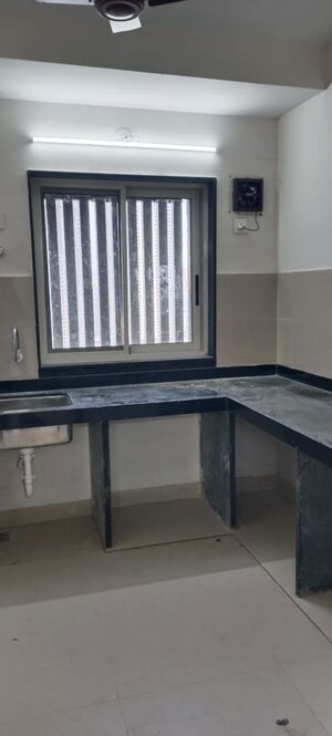 Kitchen in 2 BHK Apartment at Tower View CHS, Worli – for Rent