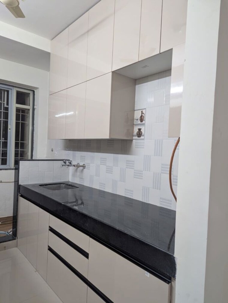 Kitchen, eden-garden-tathawade 2 Bedroom 851 Sq.Ft. Apartment In Tathawade Pune 9827586