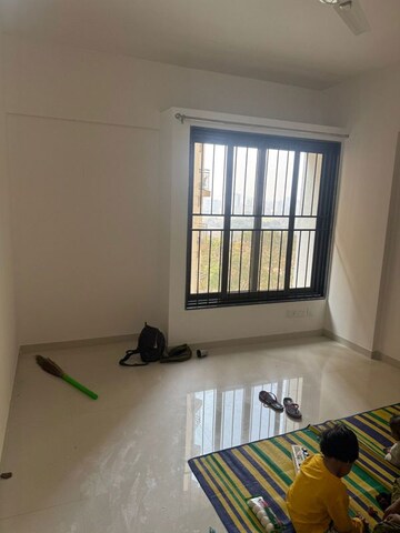 Living Room in 2 BHK Apartment at Kohinoor Courtyard One, Wakad – for Rent