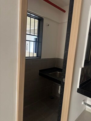 Staircase in 2 BHK Apartment at Kohinoor Courtyard One, Wakad – for Rent