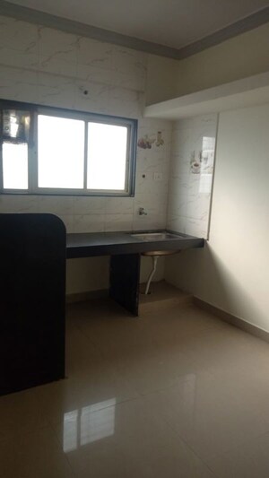 Kitchen in 2 BHK Apartment at Siddhalaxmi Complex, Akurdi – for Rent