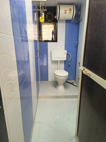 Bathroom in 2 BHK Apartment at Jai Ashoka CHS, Goregaon East – for Rent