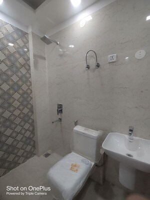 Bathroom in 3 BHK Builder Floor at Dwarka Mor – for Rent