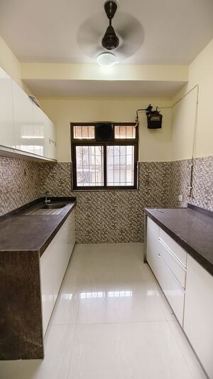 Bedroom in 2 BHK Apartment at Lalani Grandeur, Goregaon East – for Rent