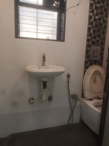 Bathroom in 2 BHK Apartment at Gaurav Geet CHS, Kandivali West – for Rent