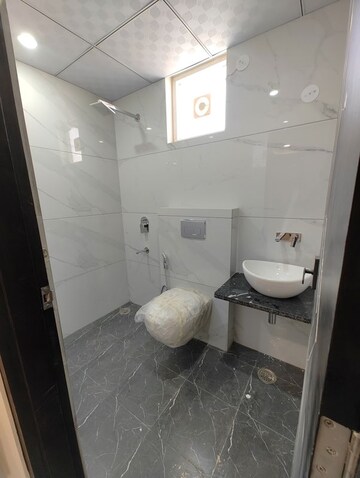 Bathroom in 3 BHK Apartment at Jagdamba Nagar – for Sale