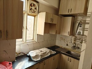 Kitchen in 2 BHK Apartment at Amrapali Golf Homes, Sector 4 Greater Noida – for Sale