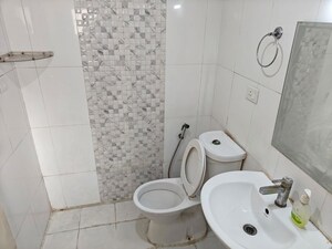 Bathroom in 2 BHK Apartment at Amrapali Golf Homes, Sector 4 Greater Noida – for Sale