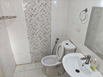 Bathroom in 2 BHK Apartment at Amrapali Golf Homes, Sector 4 Greater Noida – for Sale