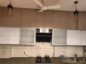 Kitchen in 3 BHK Apartment at ABA Cleo County, Sector 121 – for Rent