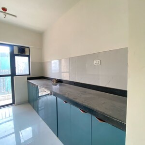 Kitchen in 3 BHK Apartment at Runwal Gardens Phase 2, Ghariwali N V – for Rent