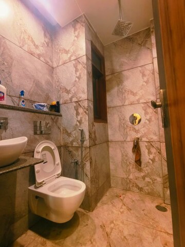 Bathroom in 3 BHK Builder Floor at Dwarka Mor – for Rent