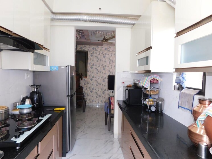 Kitchen, raymond-ten-x-era 2 Bedroom 615 Sq.Ft. Apartment In Pokhran Road No One Thane 9830321