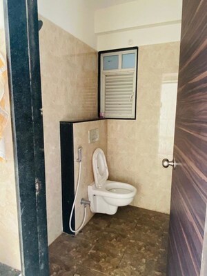 Bathroom in 2 BHK Apartment at Wadhwani Sai Paradise, Punawale – for Rent