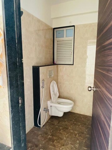 Bathroom in 2 BHK Apartment at Wadhwani Sai Paradise, Punawale – for Rent