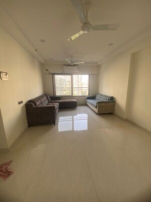 Living Room in 2 BHK Apartment at High Rise Building, Goregaon West – for Rent