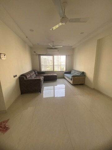 Living Room in 2 BHK Apartment at High Rise Building, Goregaon West – for Rent