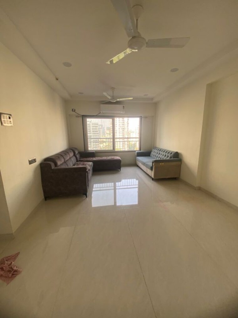 Living Room, high-rise-building 2 Bedroom 720 Sq.Ft. Apartment In Goregaon West Mumbai 9830359