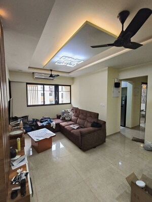 Living Room in 2 BHK Apartment at Lodha Downtown, Dombivli East – for Rent