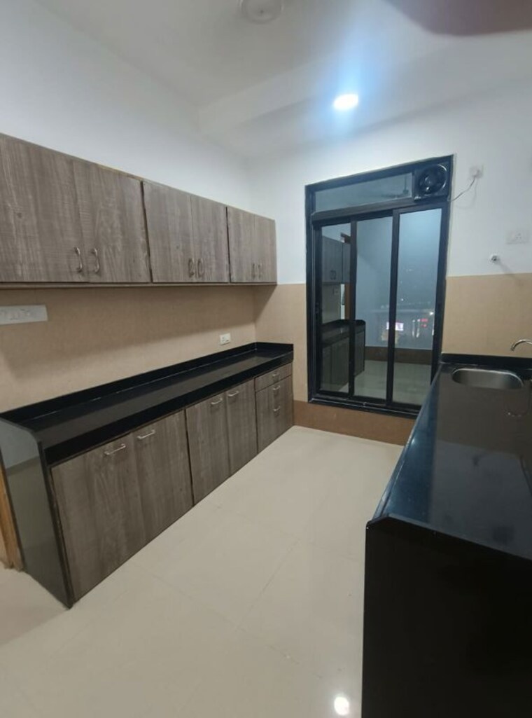 Kitchen, om-ganesh-chs-goregaon 4 Bedroom 1757 Sq.Ft. Apartment In Goregaon East Mumbai 9831046