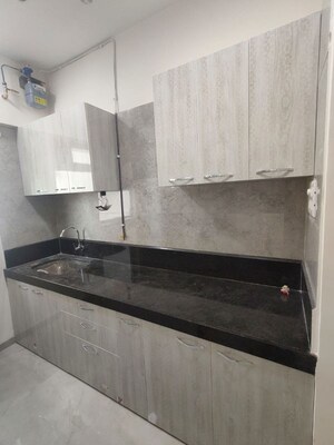 Kitchen in 1 BHK Apartment at Sheth Irene, Malad West – for Rent