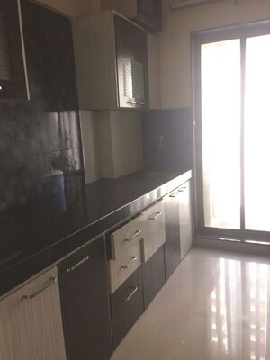 Kitchen in 4 BHK Builder Floor at Shreeji Avenue, Mira Road – for Sale