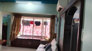 Bedroom in 1 BHK Apartment at Manish Sun Flower Apartment, Andheri West – for Rent