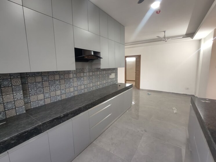 Kitchen, tulip-yellow 3 Bedroom 1704 Sq.Ft. Apartment In Sector 69 Gurgaon 9831996