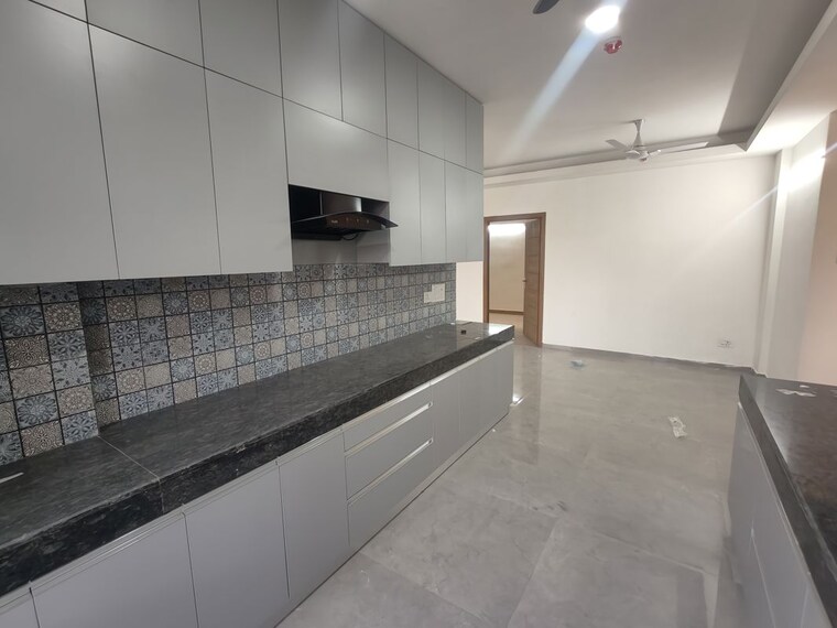 Kitchen, tulip-yellow 3 Bedroom 1704 Sq.Ft. Apartment In Sector 69 Gurgaon 9831996