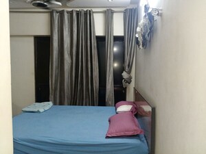 Living Room in 2 BHK Apartment at Kanakia Rainforest, Andheri East – for Rent