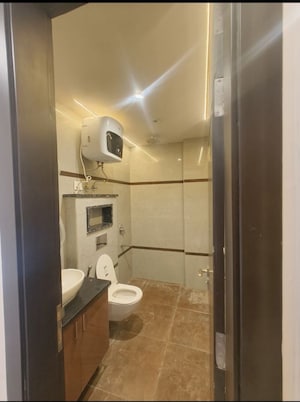 Bathroom in 4 BHK Builder Floor at Chattarpur – for Rent