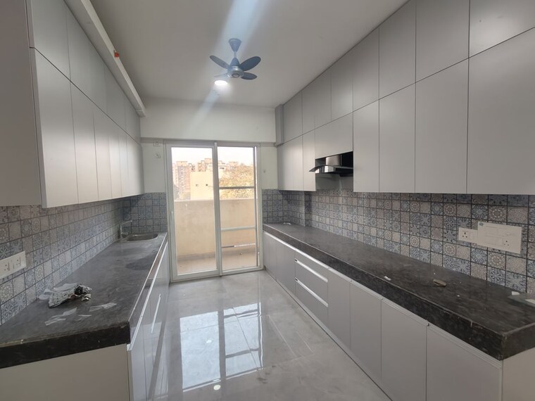 Kitchen, tulip-yellow 3 Bedroom 1704 Sq.Ft. Apartment In Sector 69 Gurgaon 9832151