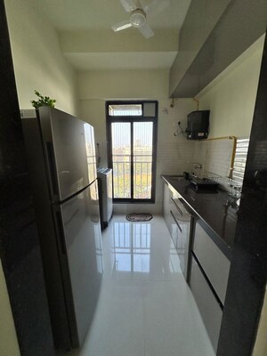 Kitchen in 2 BHK Apartment at Ani Anu Sri Balaji Enclave, Malad West – for Rent