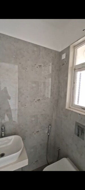 Bathroom in 2 BHK Apartment at OM Navratna CHS, Vile Parle East – for Rent