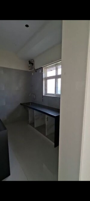 Kitchen in 2 BHK Apartment at OM Navratna CHS, Vile Parle East – for Rent