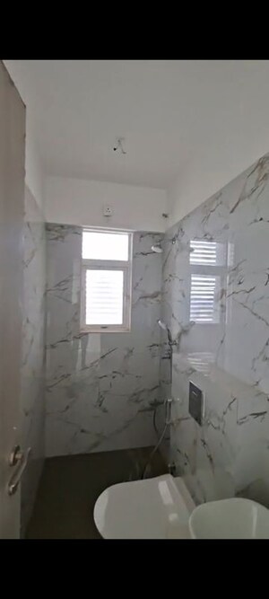 Bathroom in 2 BHK Apartment at OM Navratna CHS, Vile Parle East – for Rent