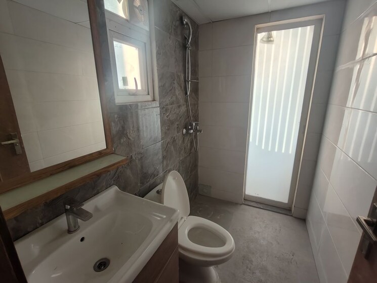 Bathroom, tulip-yellow 3 Bedroom 1704 Sq.Ft. Apartment In Sector 69 Gurgaon 9832423