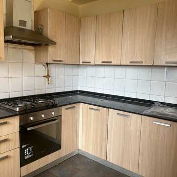 Kitchen in 3 BHK Apartment at Unitech Escape, Rosewood City – for Rent