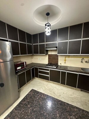 Kitchen in 4 BHK Apartment at Anand Niketan CGHS, Sector 52 – for Rent