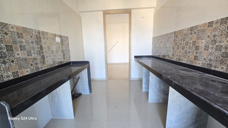 Kitchen, raj-infinia 2 Bedroom 750 Sq.Ft. Apartment In Malad West Mumbai 9832891