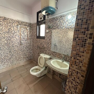 Bathroom in 4 BHK Apartment at Anand Niketan CGHS, Sarswati Kunj ii – for Rent