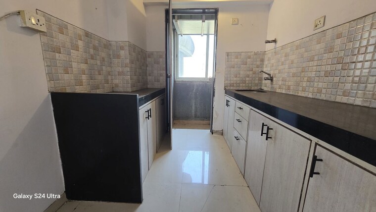 Kitchen, lotus-lotus-link-square 2 Bedroom 945 Sq.Ft. Apartment In Malad West Mumbai 9829441