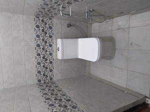 Bathroom in 3 BHK Builder Floor at Dwarka Mor – for Sale