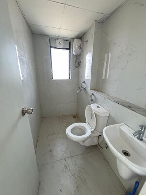 Bathroom in 3 BHK Apartment at Runwal Gardens, Dombivli East – for Rent